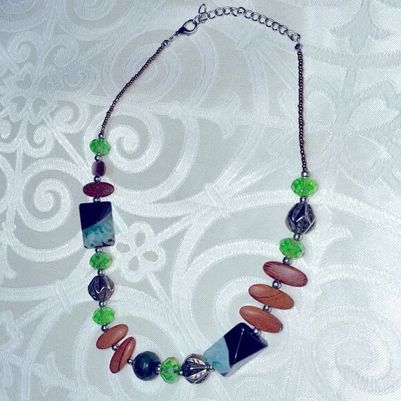 Asymmetrical bead necklace unique beads in green, blue, black, brown, & silver - Picture 4 of 7